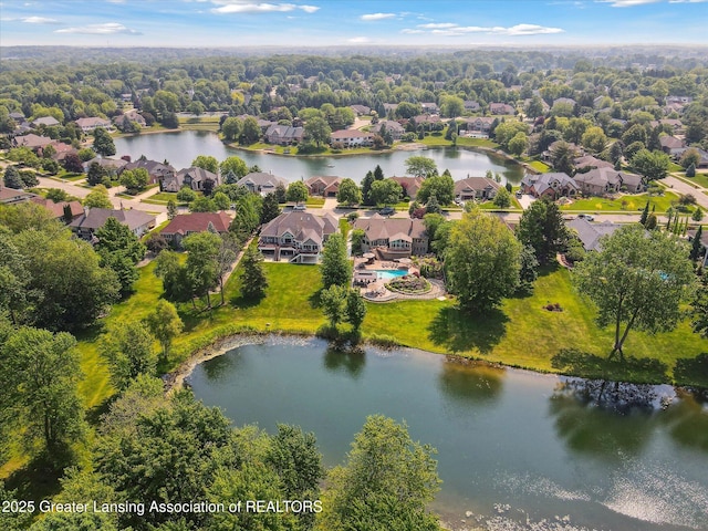 502 W Spring Meadows Ln, Dewitt, MI 48820 - aerial perspective of suburban area featuring a large body of water