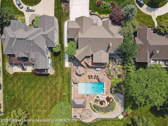502 W Spring Meadows Ln, Dewitt, MI 48820 - drone / aerial view of a pool area
