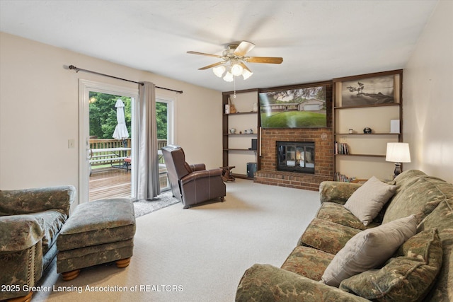 5848 S Saint Clair Rd, Saint Johns, MI 48879 - carpeted living room with ceiling fan and a fireplace