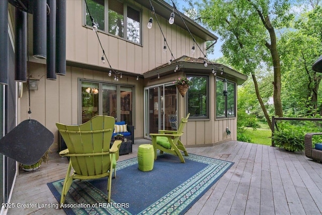 1122 Farwood Dr, East Lansing, MI 48823 - wooden deck featuring a sunroom
