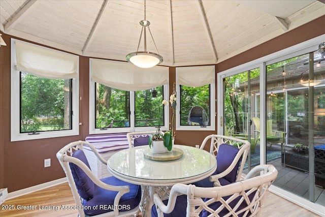 1122 Farwood Dr, East Lansing, MI 48823 - sunroom with wooden ceiling, healthy amount of natural light, wood finished floors, and lofted ceiling