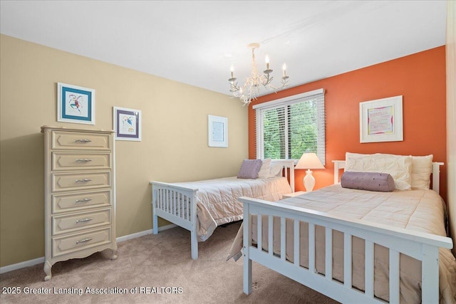 1122 Farwood Dr, East Lansing, MI 48823 - bedroom featuring a chandelier and carpet flooring