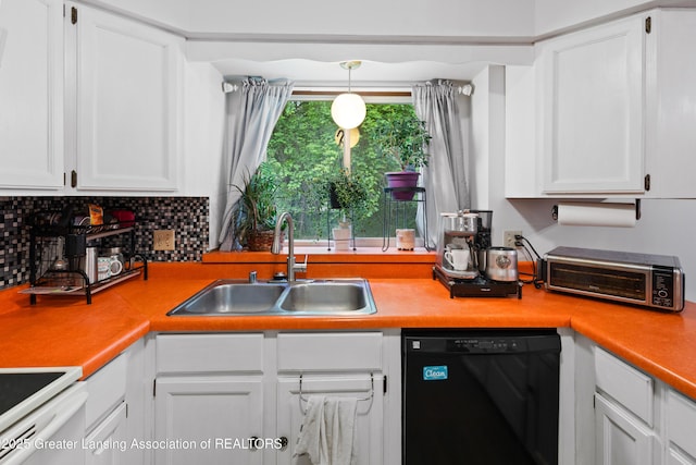 2440 Sower Blvd, Okemos, MI 48864 - kitchen featuring black dishwasher, stove, white cabinets, tasteful backsplash, and light countertops
