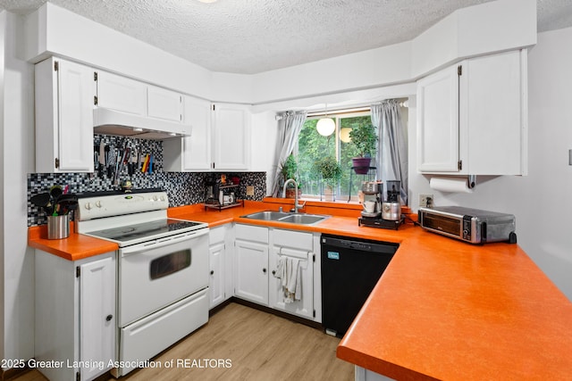 2440 Sower Blvd, Okemos, MI 48864 - kitchen featuring white range with electric cooktop, black dishwasher, under cabinet range hood, a textured ceiling, and light wood-style flooring
