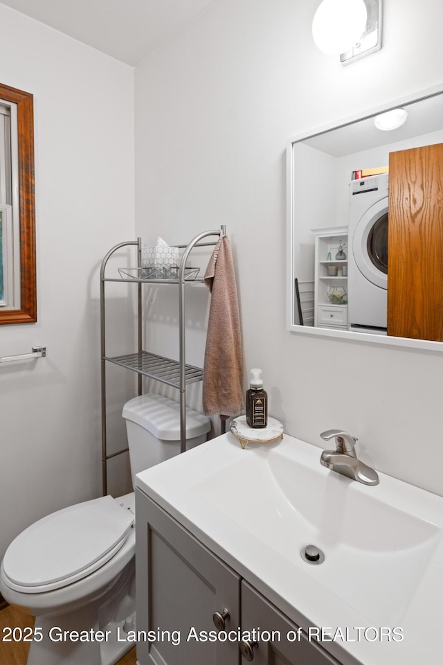 2440 Sower Blvd, Okemos, MI 48864 - half bath with washer / clothes dryer and vanity