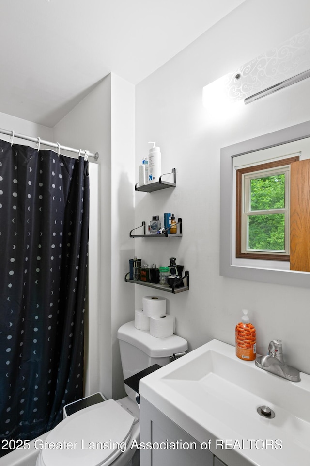 2440 Sower Blvd, Okemos, MI 48864 - full bath featuring vanity and a shower with shower curtain