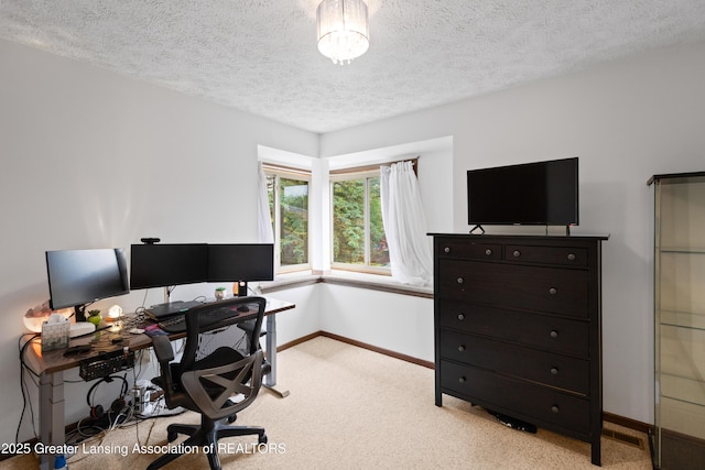 2440 Sower Blvd, Okemos, MI 48864 - office area with light carpet, a textured ceiling, and a chandelier