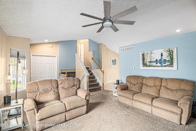 242 Coventry Ln, Mason, MI 48854 - living room featuring stairs, a ceiling fan, a textured ceiling, recessed lighting, and carpet