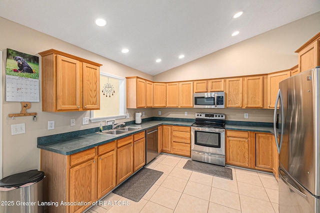 242 Coventry Ln, Mason, MI 48854 - kitchen featuring stainless steel appliances, recessed lighting, light tile patterned floors, lofted ceiling, and dark countertops