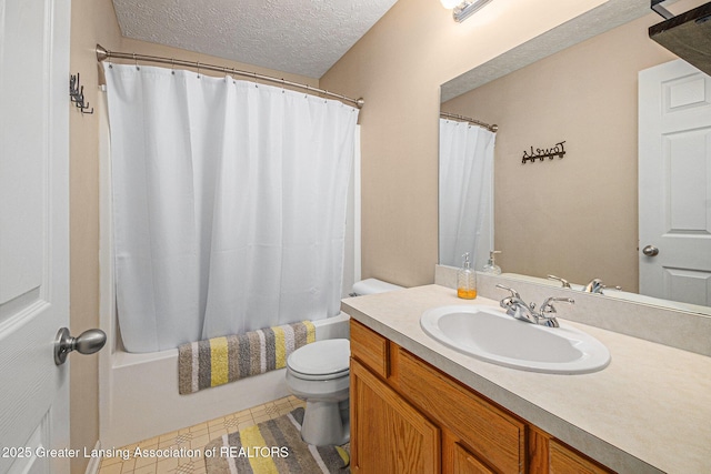 242 Coventry Ln, Mason, MI 48854 - full bathroom featuring vanity, shower / tub combo, and a textured ceiling
