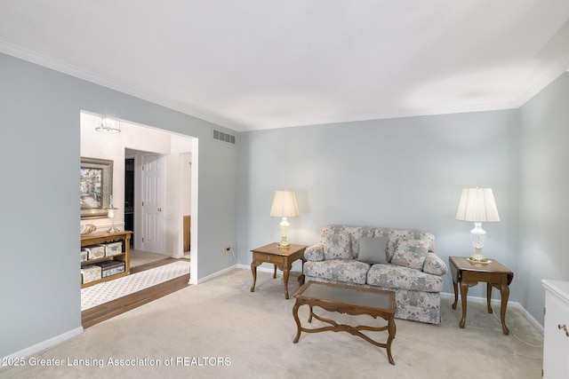 2352 Kings Cross N, East Lansing, MI 48823 - living area featuring ornamental molding and light colored carpet