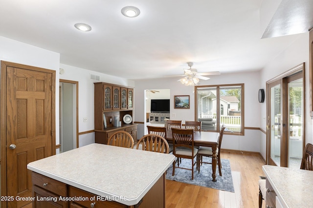 2352 Kings Cross N, East Lansing, MI 48823 - dining room featuring light wood-style floors, ceiling fan, and recessed lighting