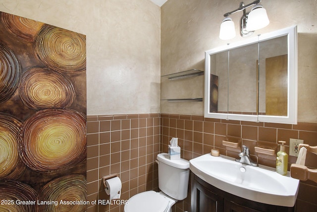 1321 Weber Dr, Lansing, MI 48912 - bathroom with vanity and tile walls