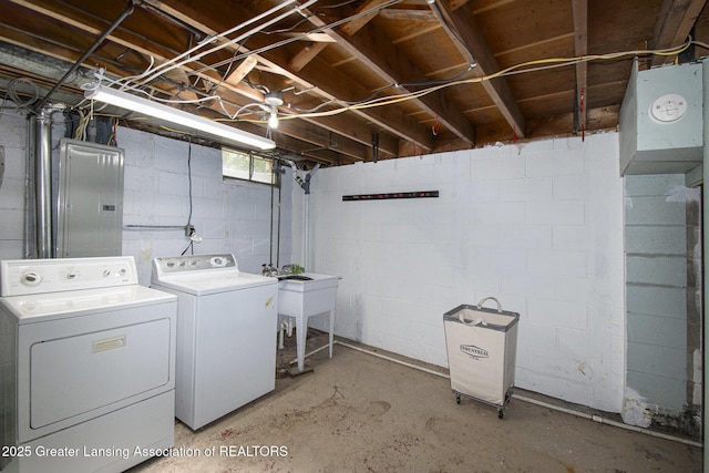 1321 Weber Dr, Lansing, MI 48912 - washroom featuring washer and clothes dryer and electric panel