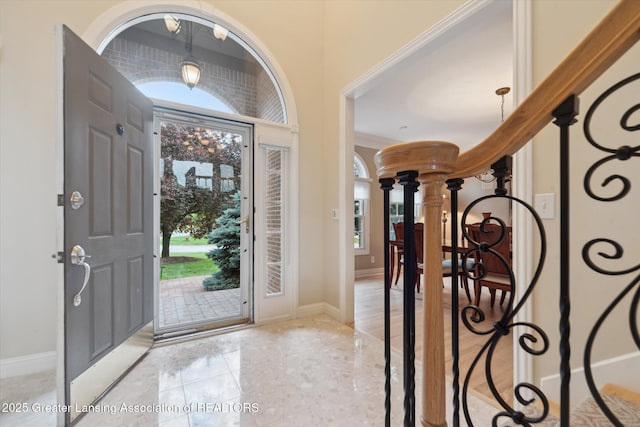 6378 E Island Lake Dr, East Lansing, MI 48823 - foyer entrance with baseboards