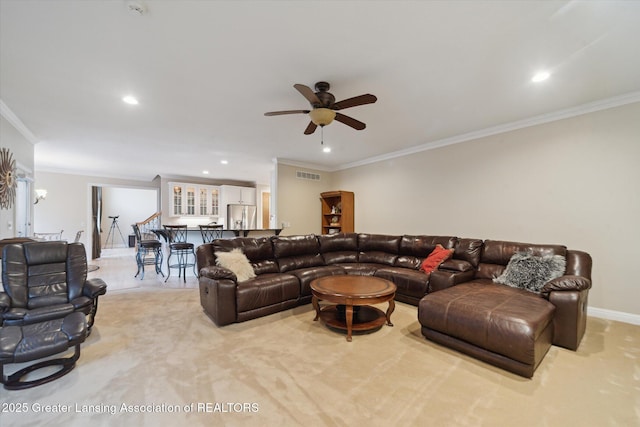 6378 E Island Lake Dr, East Lansing, MI 48823 - living room with crown molding, ceiling fan, and recessed lighting