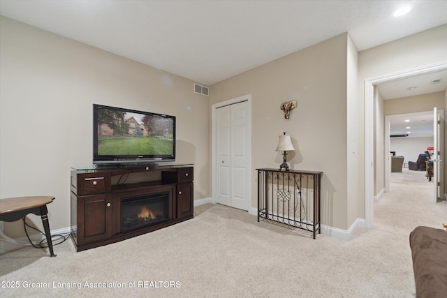 6378 E Island Lake Dr, East Lansing, MI 48823 - living room featuring carpet flooring and recessed lighting