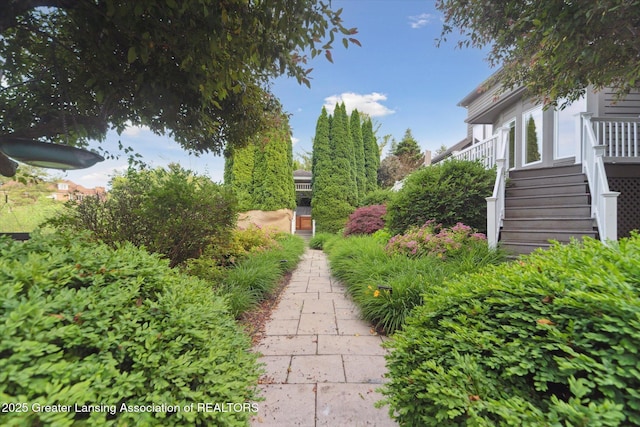 6378 E Island Lake Dr, East Lansing, MI 48823 - view of yard featuring stairway
