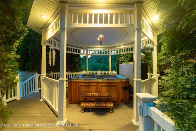 6378 E Island Lake Dr, East Lansing, MI 48823 - wooden deck featuring a hot tub