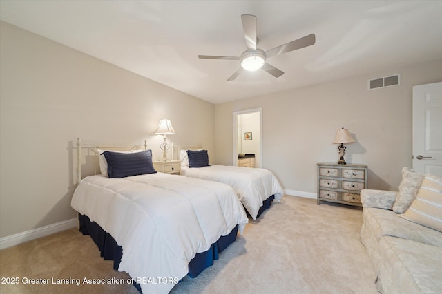 6378 E Island Lake Dr, East Lansing, MI 48823 - bedroom featuring light carpet and a ceiling fan