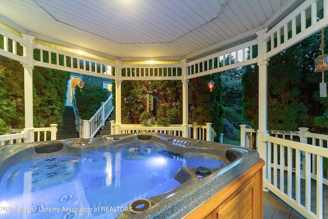 6378 E Island Lake Dr, East Lansing, MI 48823 - view of swimming pool with a hot tub and stairway