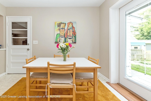 619 Wayland Ave, East Lansing, MI 48823 - dining space featuring baseboards