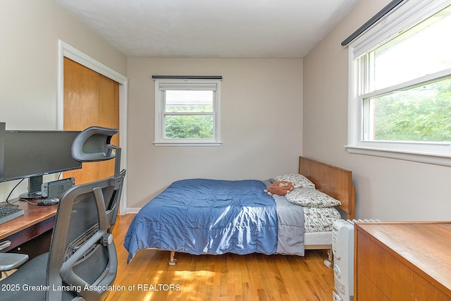 619 Wayland Ave, East Lansing, MI 48823 - bedroom featuring light wood-type flooring and a desk