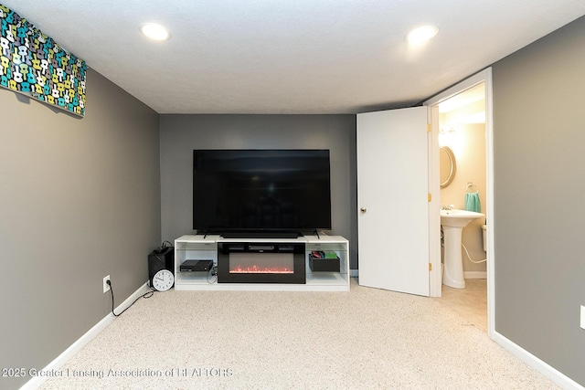 619 Wayland Ave, East Lansing, MI 48823 - living room with recessed lighting and carpet