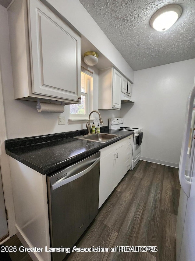 1755 Maisonette Dr, Lansing, MI 48911 - kitchen with white appliances, dark wood-style flooring, dark countertops, a textured ceiling, and white cabinetry