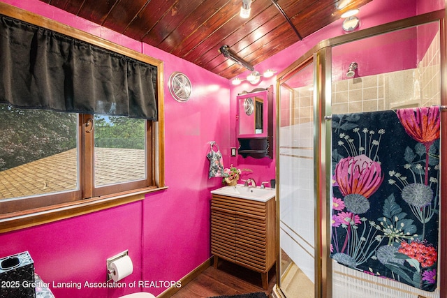 203 Branson Bay Dr, Mason, MI 48854 - full bathroom with a stall shower, vanity, wood ceiling, and wood finished floors