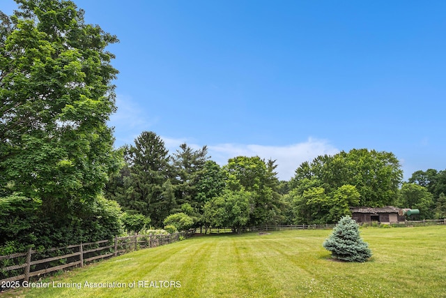 203 Branson Bay Dr, Mason, MI 48854 - view of yard with a forest view