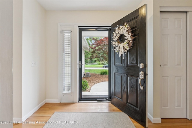 2130 Belding Ct, Okemos, MI 48864 - entrance foyer with light wood-style floors