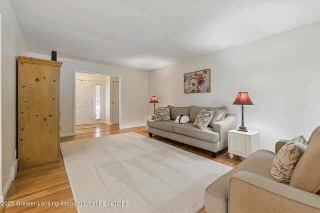 2130 Belding Ct, Okemos, MI 48864 - living room featuring light wood finished floors and baseboards