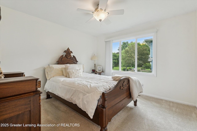 2130 Belding Ct, Okemos, MI 48864 - carpeted bedroom featuring baseboards and ceiling fan