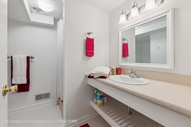 2130 Belding Ct, Okemos, MI 48864 - bathroom featuring vanity, ornamental molding, and a shower with curtain