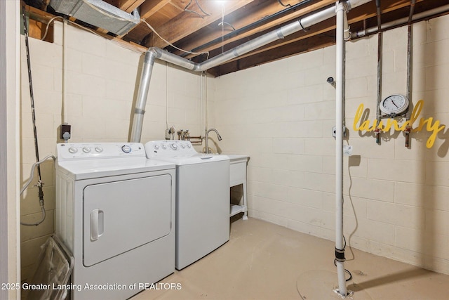 2130 Belding Ct, Okemos, MI 48864 - laundry room with separate washer and dryer and concrete block wall