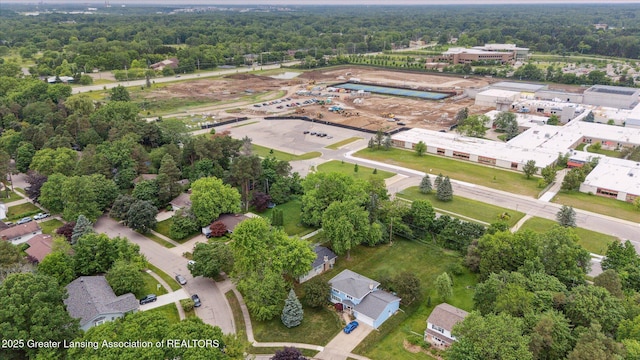 2130 Belding Ct, Okemos, MI 48864 - aerial view of property's location featuring a heavily wooded area
