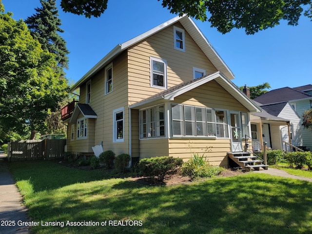 1201 Climax St, Lansing, MI 48912 - view of front facade with a sunroom
