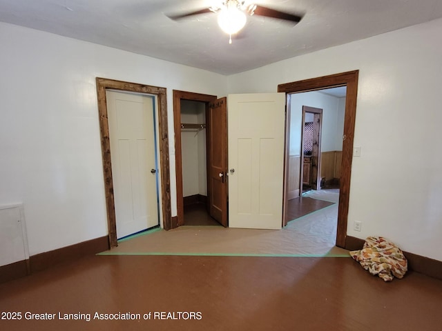 1201 Climax St, Lansing, MI 48912 - unfurnished bedroom with multiple closets and a ceiling fan