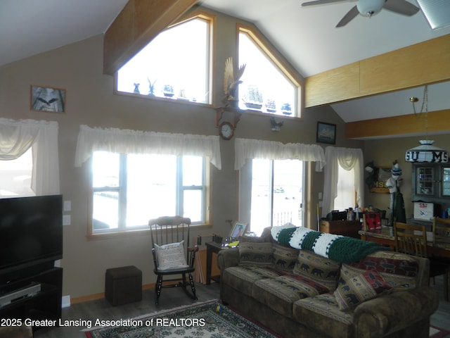 202 Broadway Rd, Houghton Lake, MI 48629 - living room with ceiling fan and high vaulted ceiling