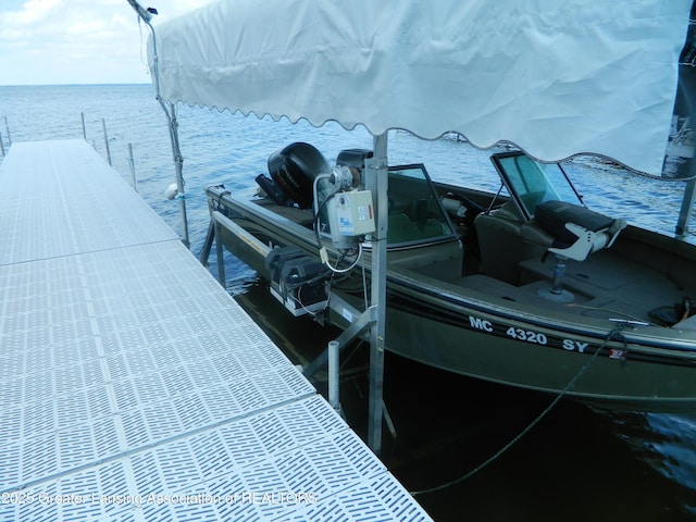 202 Broadway Rd, Houghton Lake, MI 48629 - dock with a water view and boat lift