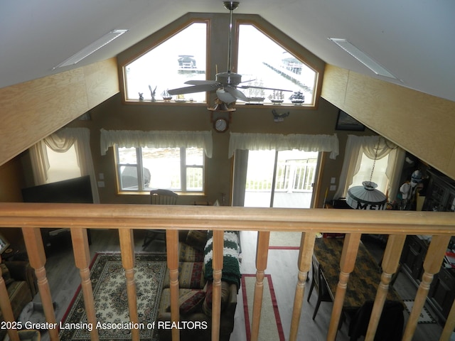 202 Broadway Rd, Houghton Lake, MI 48629 - additional living space featuring ceiling fan, lofted ceiling, and wood finished floors