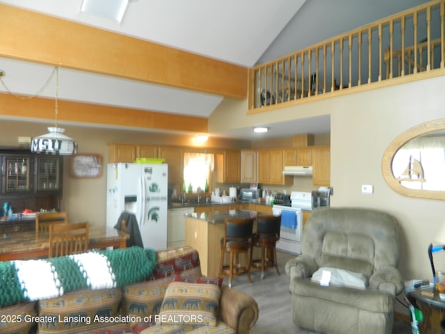 202 Broadway Rd, Houghton Lake, MI 48629 - living area featuring lofted ceiling and light carpet
