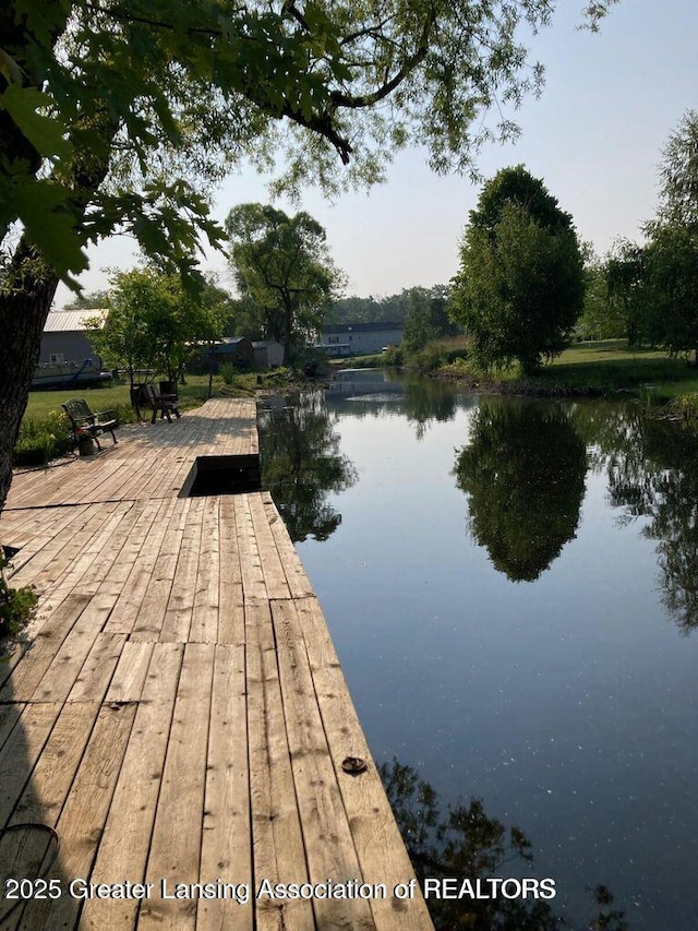 4701 W Channel Dr, Stanton, MI 48888 - dock area featuring a water view