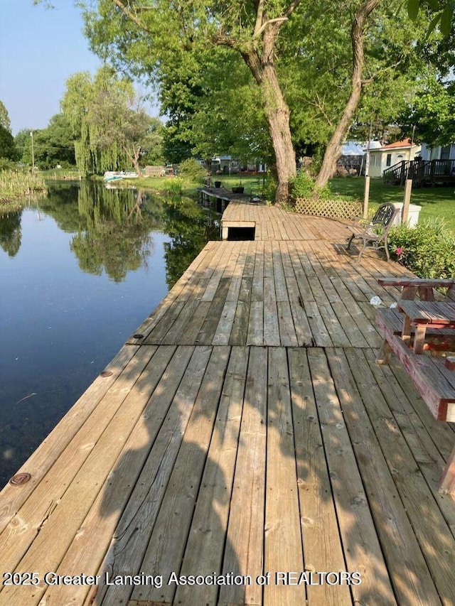 4701 W Channel Dr, Stanton, MI 48888 - dock with a water view