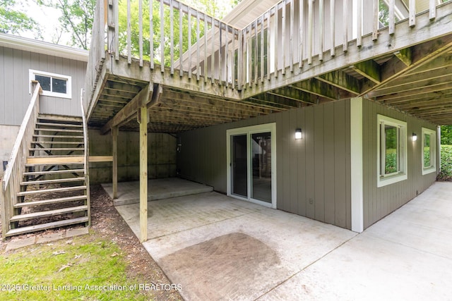 9481 S Clinton Trl, Eaton Rapids, MI 48827 - view of patio featuring stairway