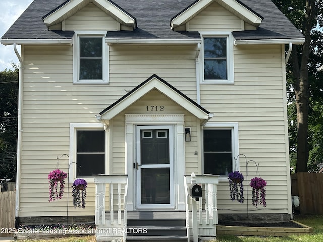 1712 Osborn Rd, Lansing, MI 48915 - view of front of house with entry steps and roof with shingles