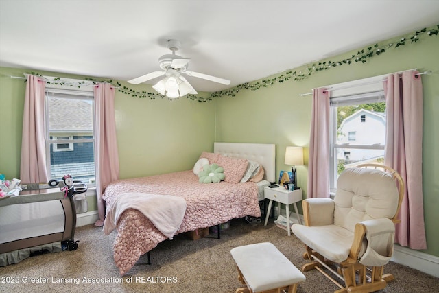 209 N Bowen St, Jackson, MI 49202 - bedroom with carpet and ceiling fan