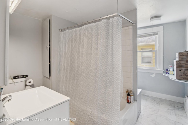209 N Bowen St, Jackson, MI 49202 - full bath with vanity, shower / bath combination with curtain, and marble finish flooring