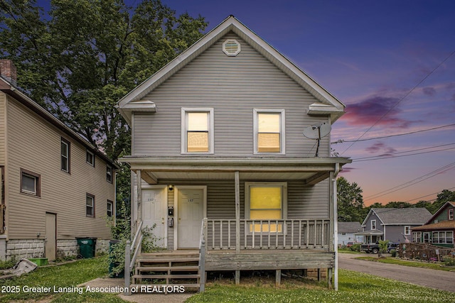 147 Isbell St, Lansing, MI 48910 - view of front of house with a porch